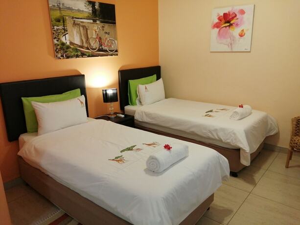 Imagen de la habitación del Hotel Capbon Guesthouse. Foto 18