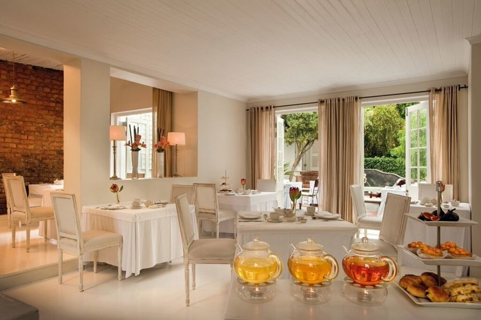 Imagen del bar/restaurante del Hotel Cape Cadogan Boutique. Foto 3