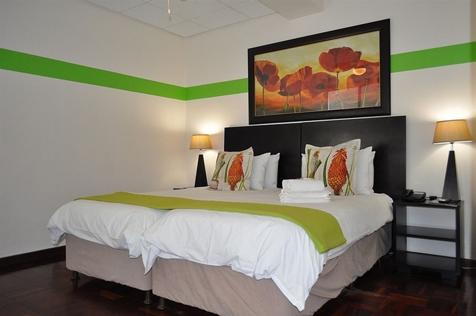 Imagen de la habitación del Hotel Cape Diamond Boutique. Foto 11