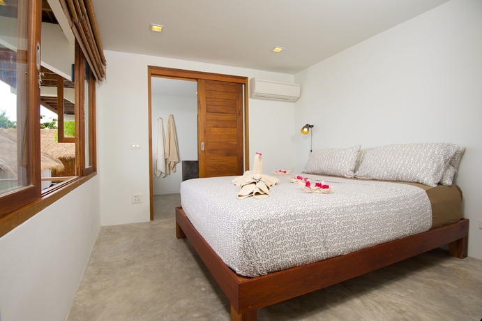 Imagen de la habitación del Hotel Cape Shark Pool Villas. Foto 9