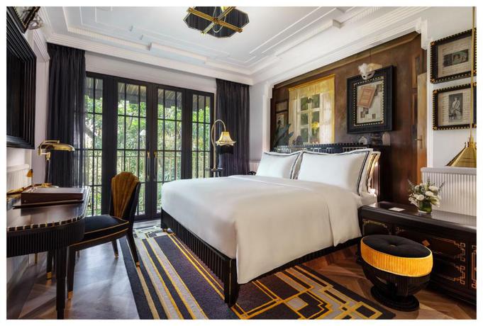 Imagen de la habitación del Hotel Capella Hanoi. Foto 7