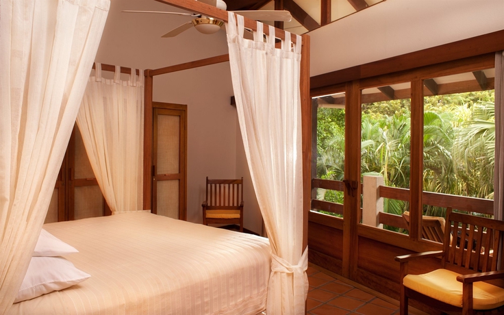 Imagen de la habitación del Hotel Capitán Suizo Beachfront Boutique. Foto 3