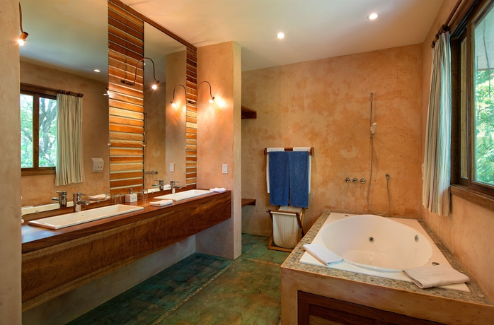 Imagen de la habitación del Hotel Capitán Suizo Beachfront Boutique. Foto 8