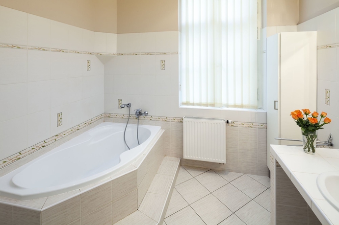 Imagen de la habitación del Hotel Capital Apartments. Foto 11