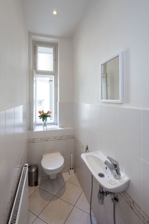 Imagen de la habitación del Hotel Capital Apartments. Foto 12