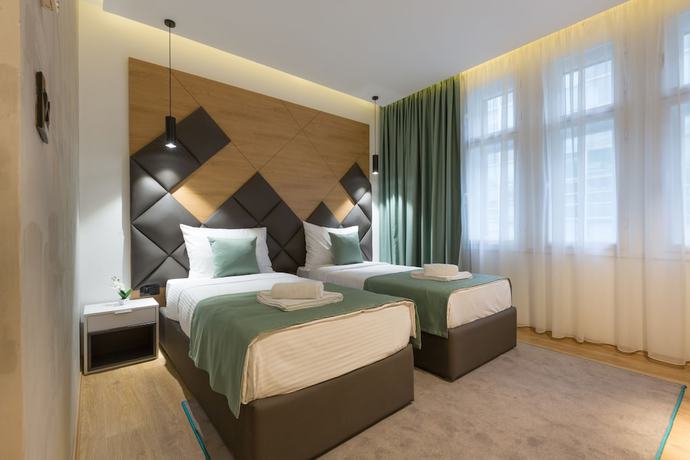 Imagen de la habitación del Hotel Capital Garni. Foto 8