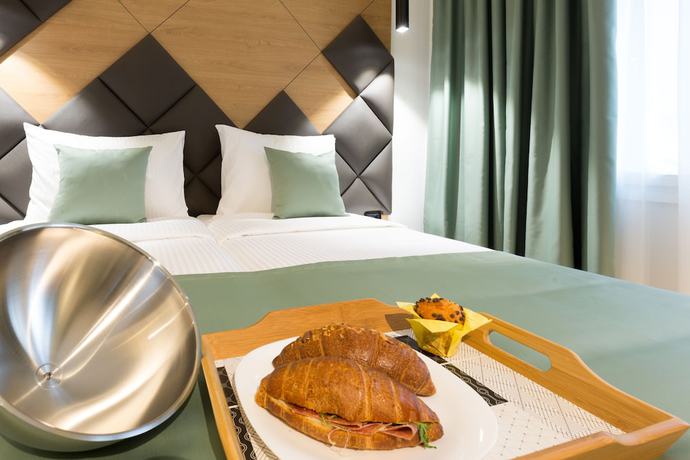 Imagen de la habitación del Hotel Capital Garni. Foto 13