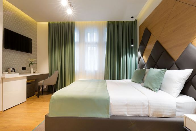 Imagen de la habitación del Hotel Capital Garni. Foto 16