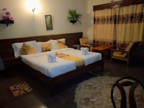 Imagen de la habitación del Hotel Capital Hill Lodge. Foto 5