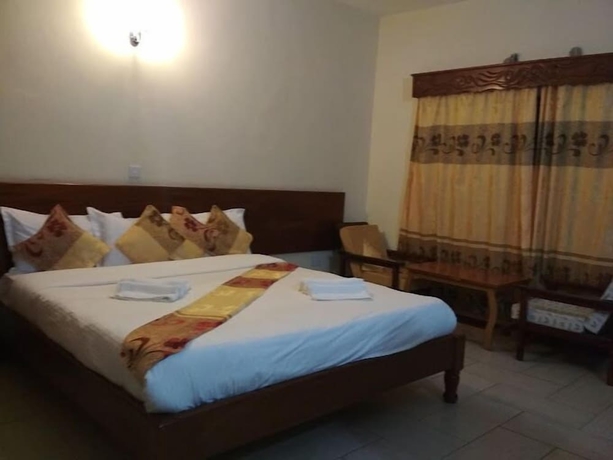 Imagen de la habitación del Hotel Capital Hill Lodge. Foto 6