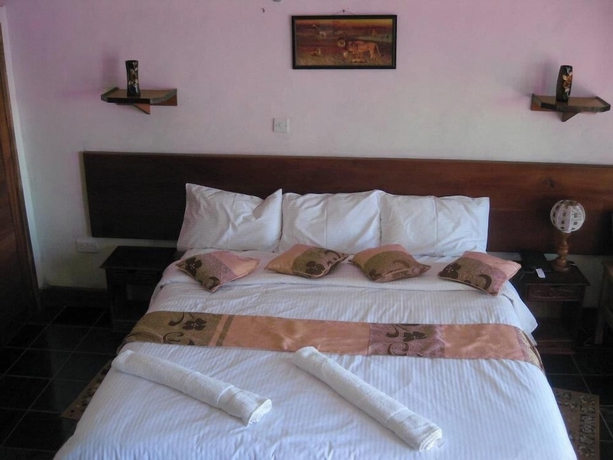 Imagen de la habitación del Hotel Capital Hill Lodge. Foto 8