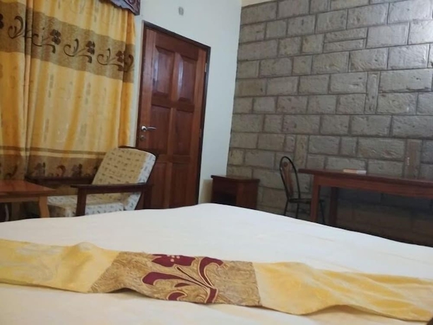 Imagen de la habitación del Hotel Capital Hill Lodge. Foto 9