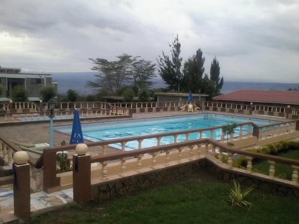 Imagen de la piscina del Hotel Capital Hill Lodge. Foto 10