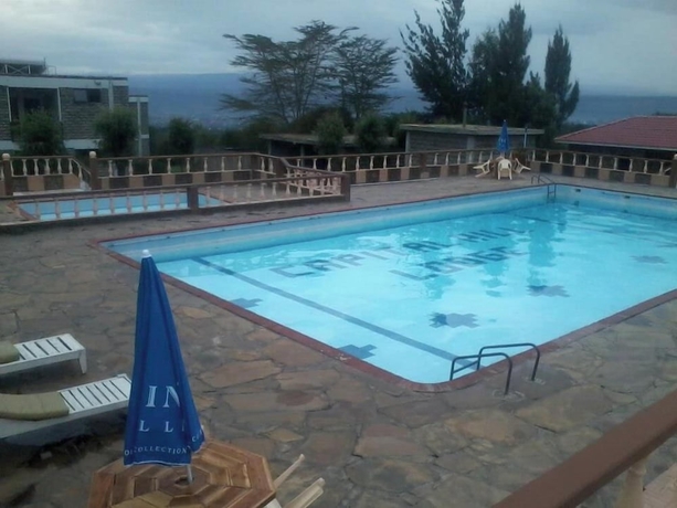 Imagen de la piscina del Hotel Capital Hill Lodge. Foto 11