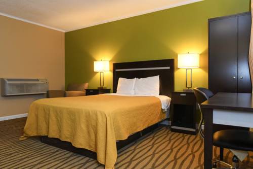 Imagen de la habitación del Hotel Capital Inn And Suites. Foto 1