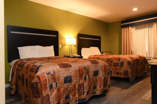 Imagen de la habitación del Hotel Capital Inn And Suites. Foto 5