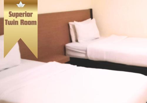 Imagen de la habitación del Hotel Capital Makassar. Foto 18