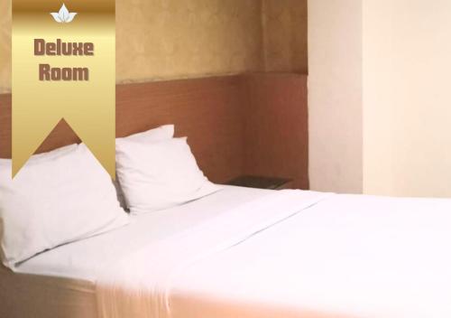 Imagen de la habitación del Hotel Capital Makassar. Foto 19