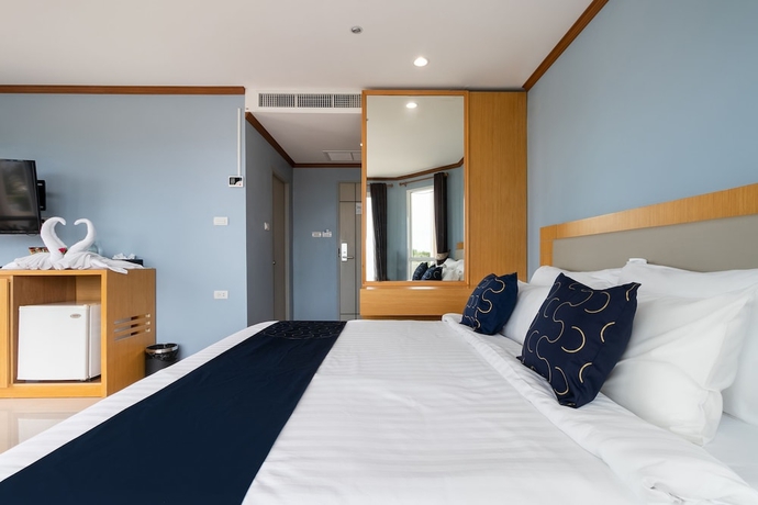 Imagen de la habitación del Hotel Capital O 1008 Golden Beach Boutique Resort. Foto 3