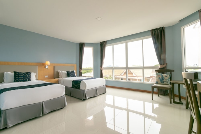 Imagen de la habitación del Hotel Capital O 1008 Golden Beach Boutique Resort. Foto 5