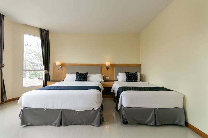 Imagen de la habitación del Hotel Capital O 1008 Golden Beach Boutique Resort. Foto 7