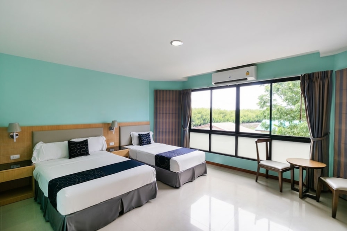 Imagen de la habitación del Hotel Capital O 1008 Golden Beach Boutique Resort. Foto 8