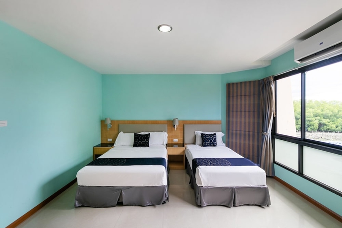 Imagen de la habitación del Hotel Capital O 1008 Golden Beach Boutique Resort. Foto 9