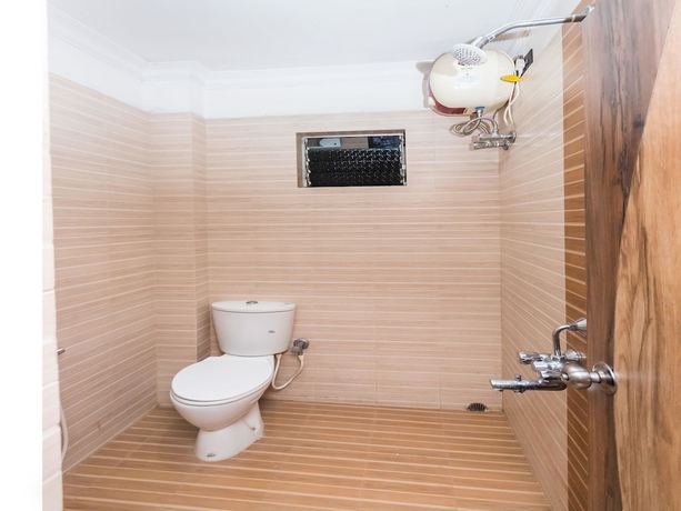 Imagen de la habitación del Hotel Capital O 10307 Bidisha. Foto 13