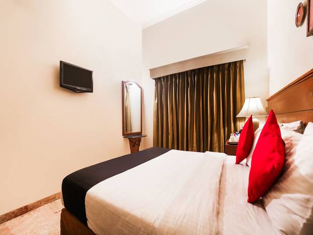 Imagen de la habitación del Hotel Capital O 10953 Dayal Lodge - A Boutique. Foto 2