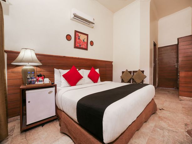 Imagen de la habitación del Hotel Capital O 10953 Dayal Lodge - A Boutique. Foto 11