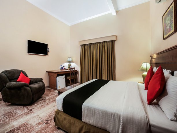 Imagen de la habitación del Hotel Capital O 10953 Dayal Lodge - A Boutique. Foto 12
