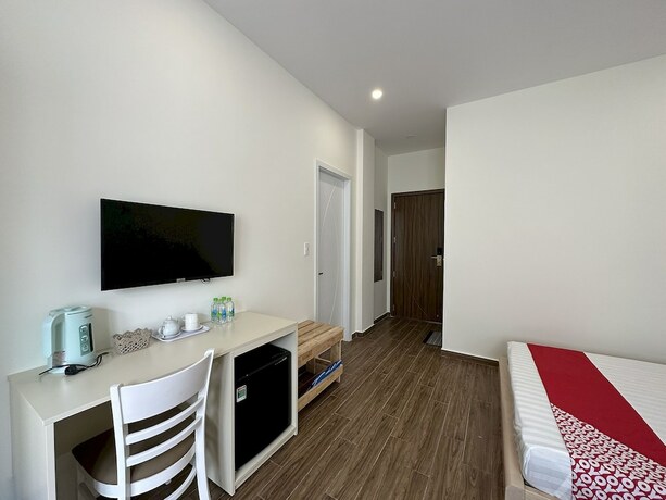 Imagen de la habitación del Hotel Capital O 1208 Phong Van Villa. Foto 12