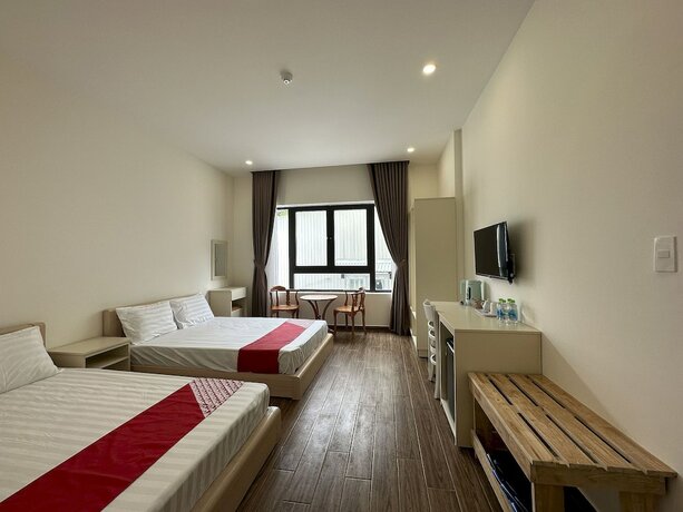 Imagen de la habitación del Hotel Capital O 1208 Phong Van Villa. Foto 13