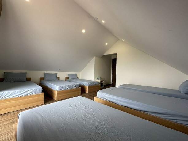 Imagen de la habitación del Hotel Capital O 1208 Phong Van Villa. Foto 15