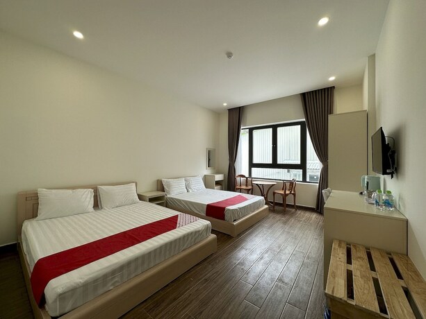 Imagen de la habitación del Hotel Capital O 1208 Phong Van Villa. Foto 17