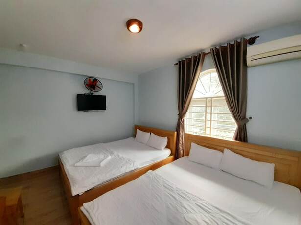 Imagen de la habitación del Hotel Capital O 1221 Thien An. Foto 17