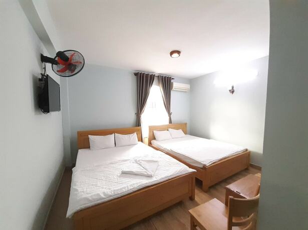Imagen de la habitación del Hotel Capital O 1221 Thien An. Foto 18