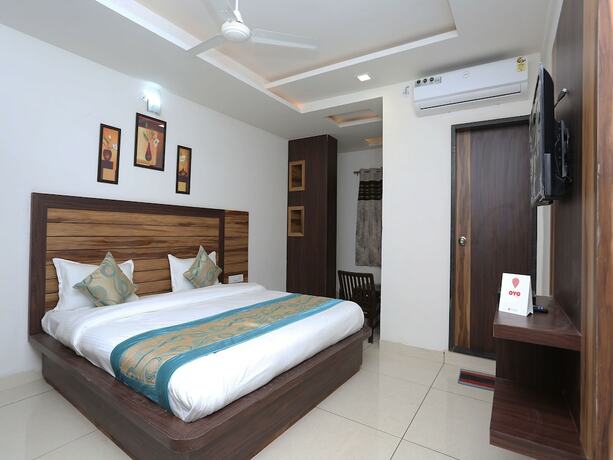 Imagen de la habitación del Hotel Capital O 12341 Madhuram Landmark. Foto 1