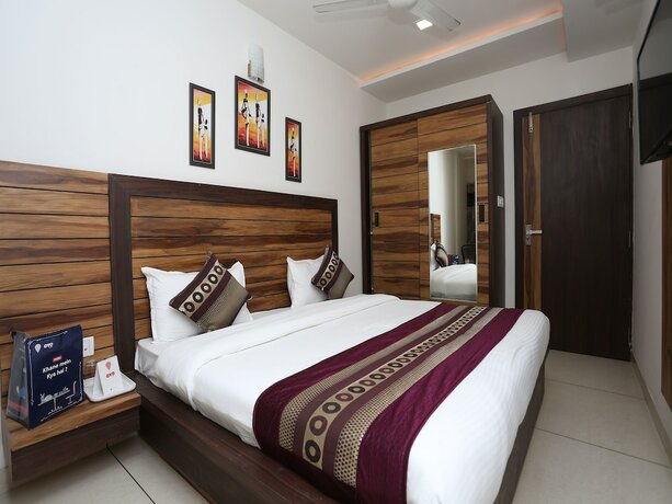 Imagen de la habitación del Hotel Capital O 12341 Madhuram Landmark. Foto 7