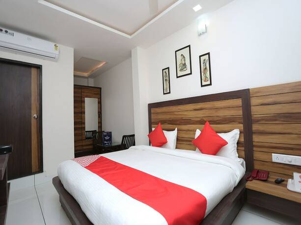 Imagen de la habitación del Hotel Capital O 12341 Madhuram Landmark. Foto 10