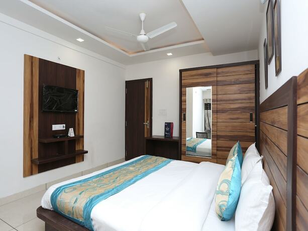 Imagen de la habitación del Hotel Capital O 12341 Madhuram Landmark. Foto 12