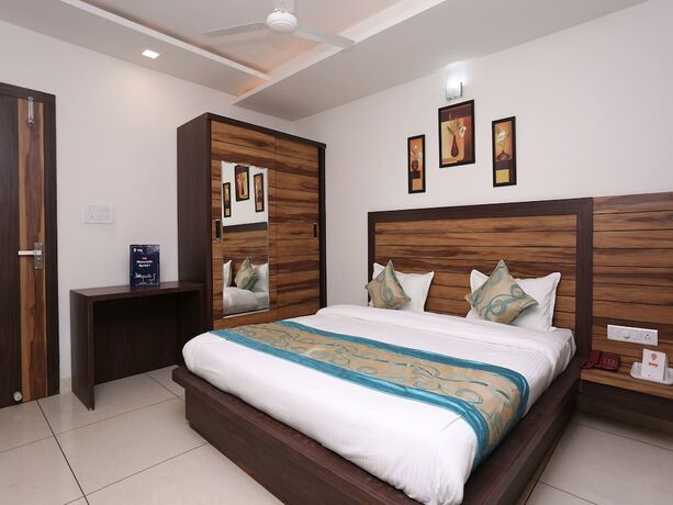 Imagen de la habitación del Hotel Capital O 12341 Madhuram Landmark. Foto 13
