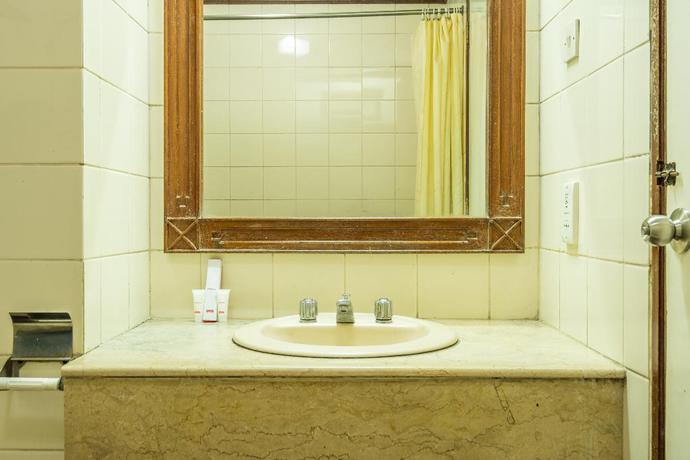 Imagen de la habitación del Hotel Capital O 1256 Sangga Buana Resort and Convention Hotel. Foto 12