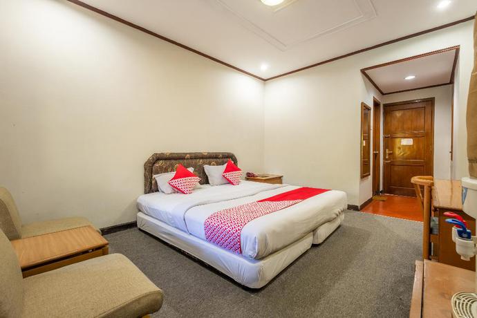 Imagen de la habitación del Hotel Capital O 1256 Sangga Buana Resort and Convention Hotel. Foto 14