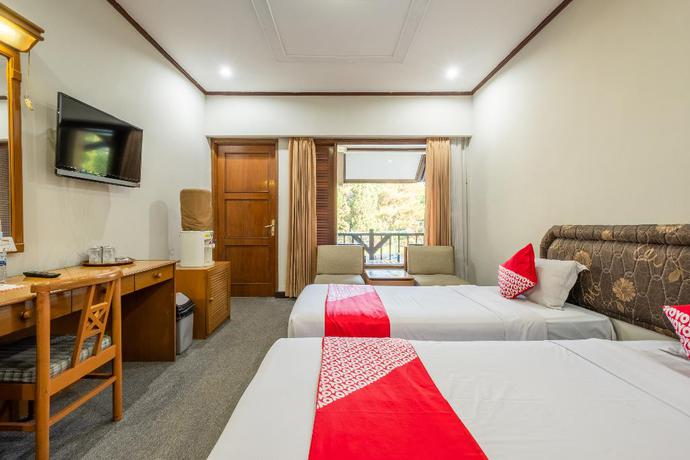 Imagen de la habitación del Hotel Capital O 1256 Sangga Buana Resort and Convention Hotel. Foto 15