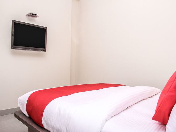 Imagen de la habitación del Hotel Capital O 14864 Satyam Inn. Foto 16