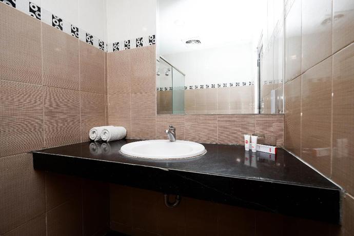 Imagen de la habitación del Hotel Capital O 1571 Utc Hotel Semarang. Foto 15