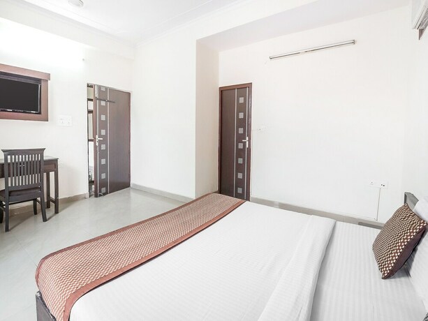 Imagen de la habitación del Hotel Capital O 15929 Comfort Residency. Foto 18