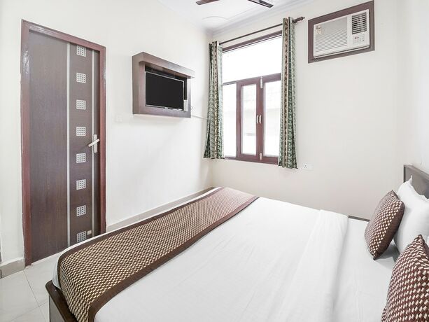 Imagen de la habitación del Hotel Capital O 15929 Comfort Residency. Foto 26