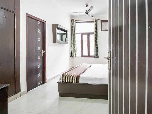 Imagen de la habitación del Hotel Capital O 15929 Comfort Residency. Foto 34